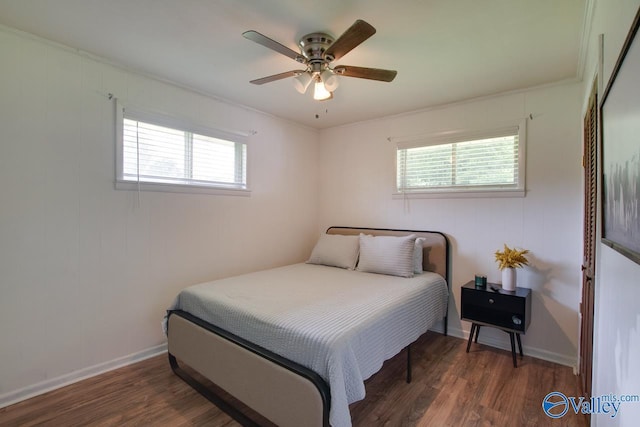 7615 Scottsboro Hwy, Scottsboro, AL 35769 - bedroom with a ceiling fan, multiple windows, and wood finished floors