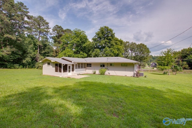 7615 Scottsboro Hwy, Scottsboro, AL 35769 - back of house with a patio and a yard