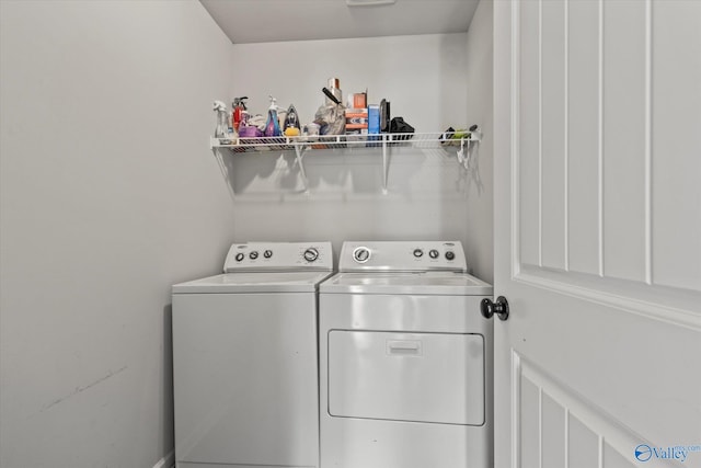 washroom featuring separate washer and dryer