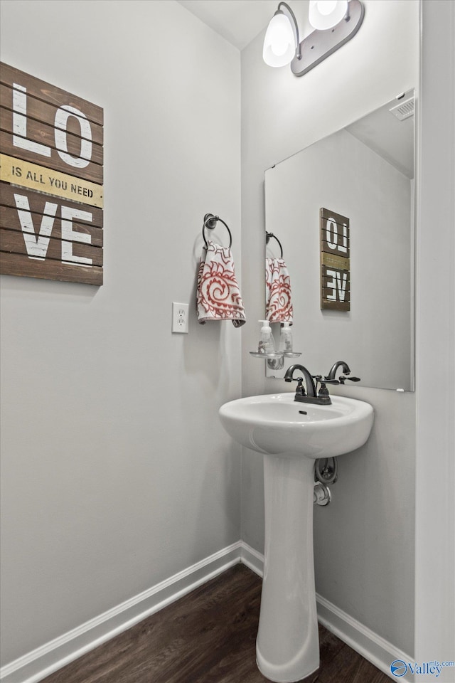 bathroom featuring hardwood / wood-style flooring