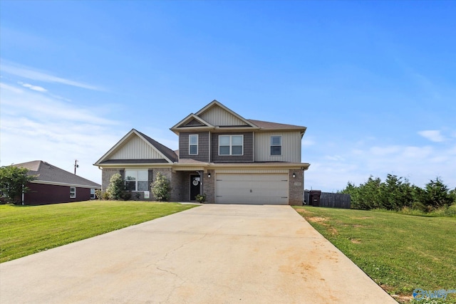 craftsman house featuring a garage and a front lawn