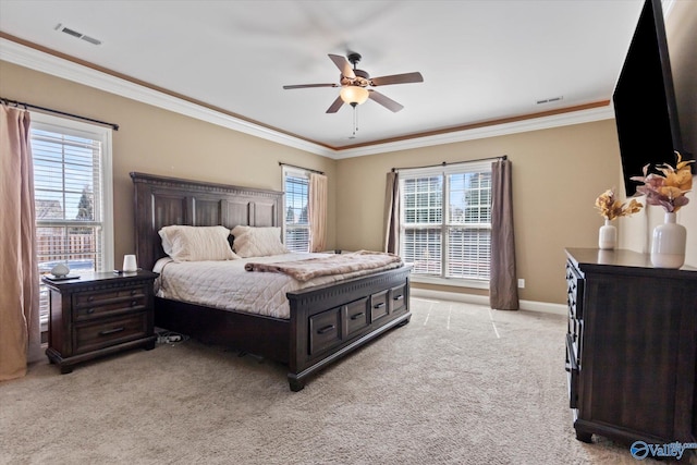 bedroom with visible vents, ornamental molding, light carpet, ceiling fan, and baseboards