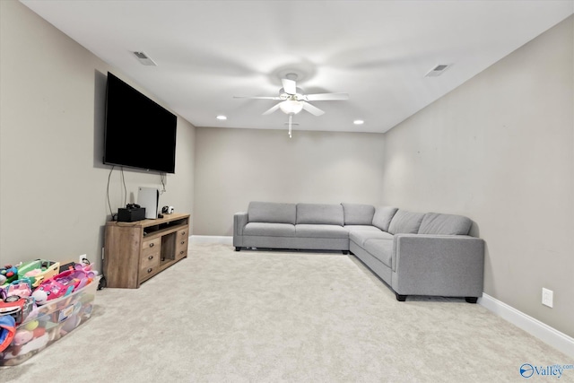 living room featuring baseboards, visible vents, ceiling fan, and carpet flooring