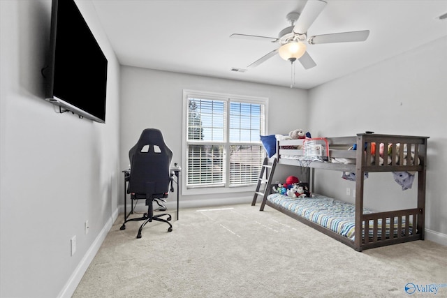 bedroom with ceiling fan, carpet floors, visible vents, and baseboards