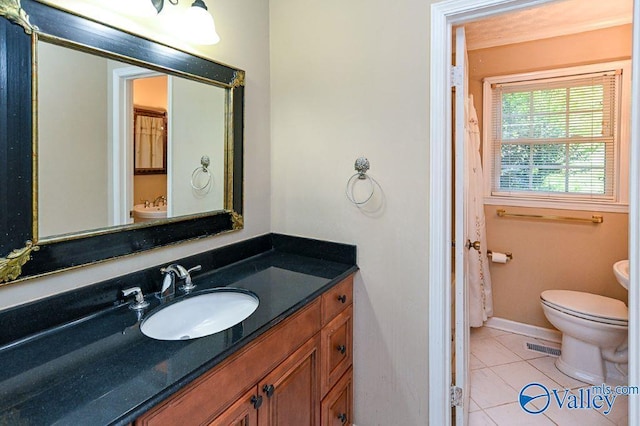 full bathroom with vanity, baseboards, toilet, tile patterned flooring, and visible vents