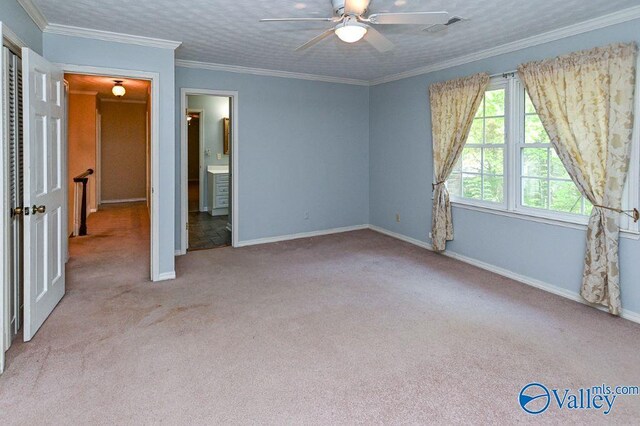 unfurnished bedroom featuring baseboards, a ceiling fan, and carpet flooring