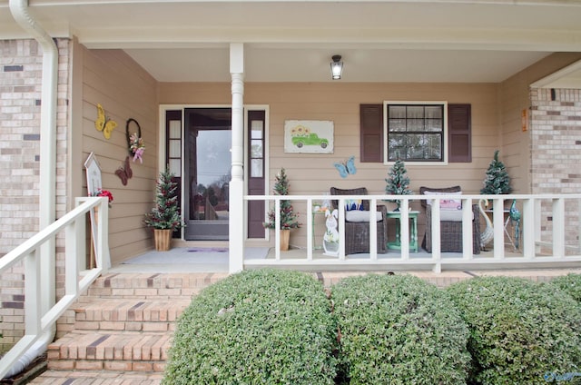 property entrance featuring covered porch