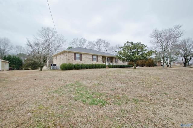 ranch-style house with a front lawn