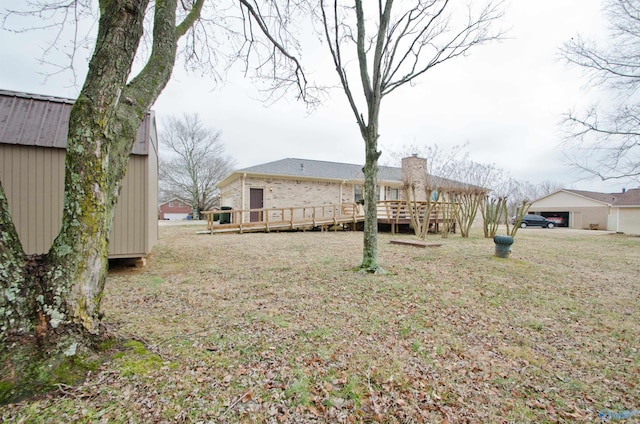 view of yard featuring a deck