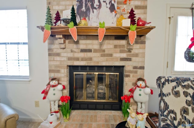 details featuring a brick fireplace