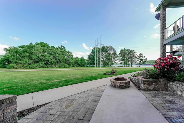 view of patio featuring an outdoor fire pit