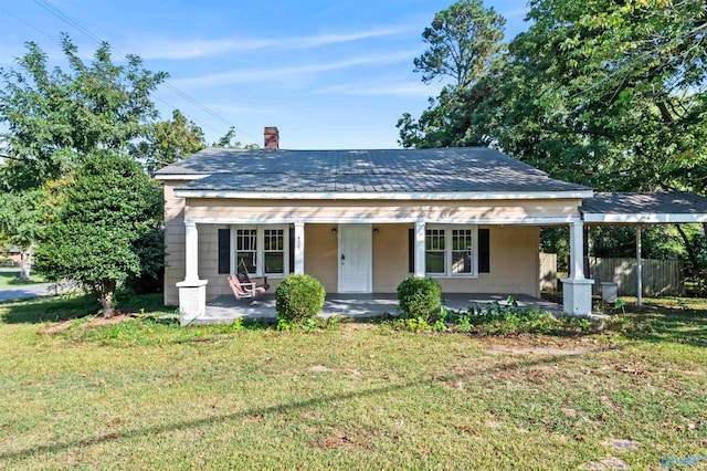 bungalow-style home with a porch and a front yard