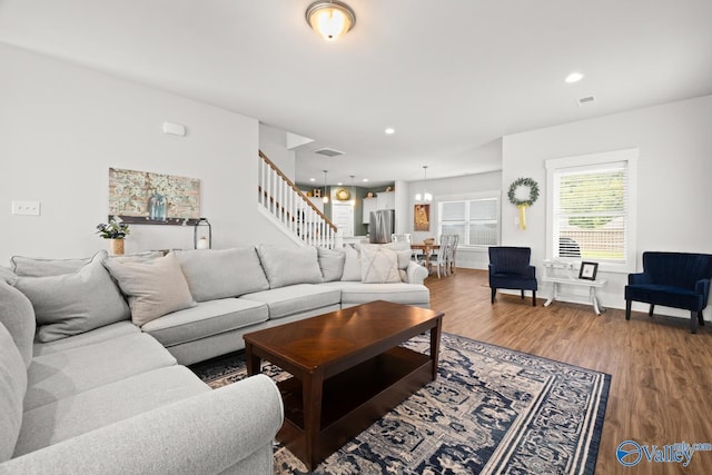 9130 Monteagle Blvd, Owens Cross Roads, AL 35763 - living room with wood finished floors, stairs, and recessed lighting
