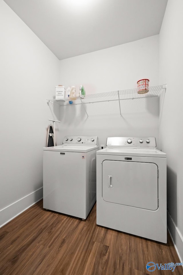 9130 Monteagle Blvd, Owens Cross Roads, AL 35763 - laundry area with washer and clothes dryer, dark wood-style floors, and baseboards