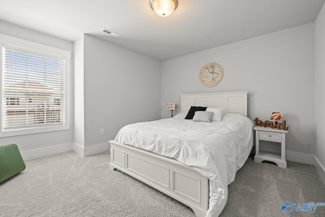 9130 Monteagle Blvd, Owens Cross Roads, AL 35763 - bedroom with light colored carpet and baseboards