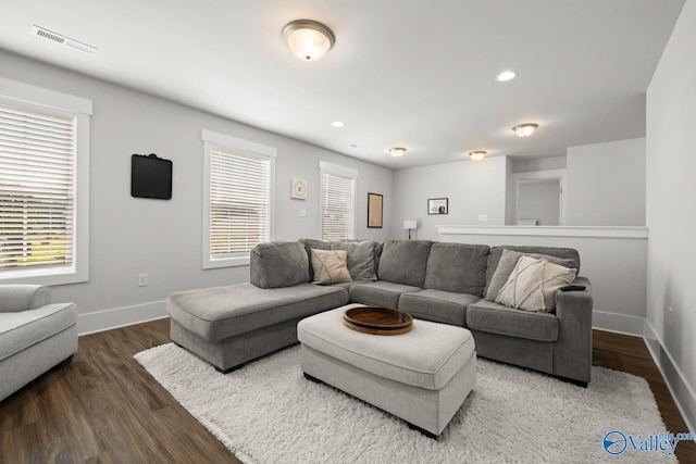 9130 Monteagle Blvd, Owens Cross Roads, AL 35763 - living room with dark wood finished floors, baseboards, and recessed lighting