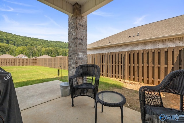 9130 Monteagle Blvd, Owens Cross Roads, AL 35763 - view of patio / terrace with a wooded view