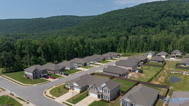 9130 Monteagle Blvd, Owens Cross Roads, AL 35763 - aerial perspective of suburban area featuring a forest