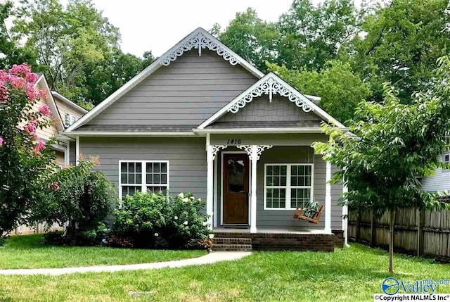 view of front of home with a front lawn