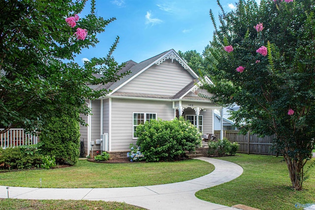 view of front of home with a front lawn