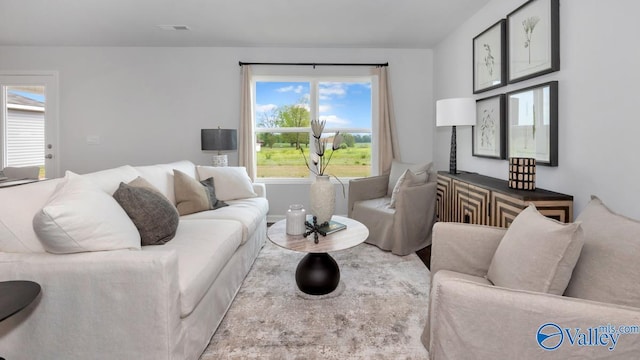 living area featuring visible vents