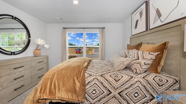 bedroom featuring visible vents