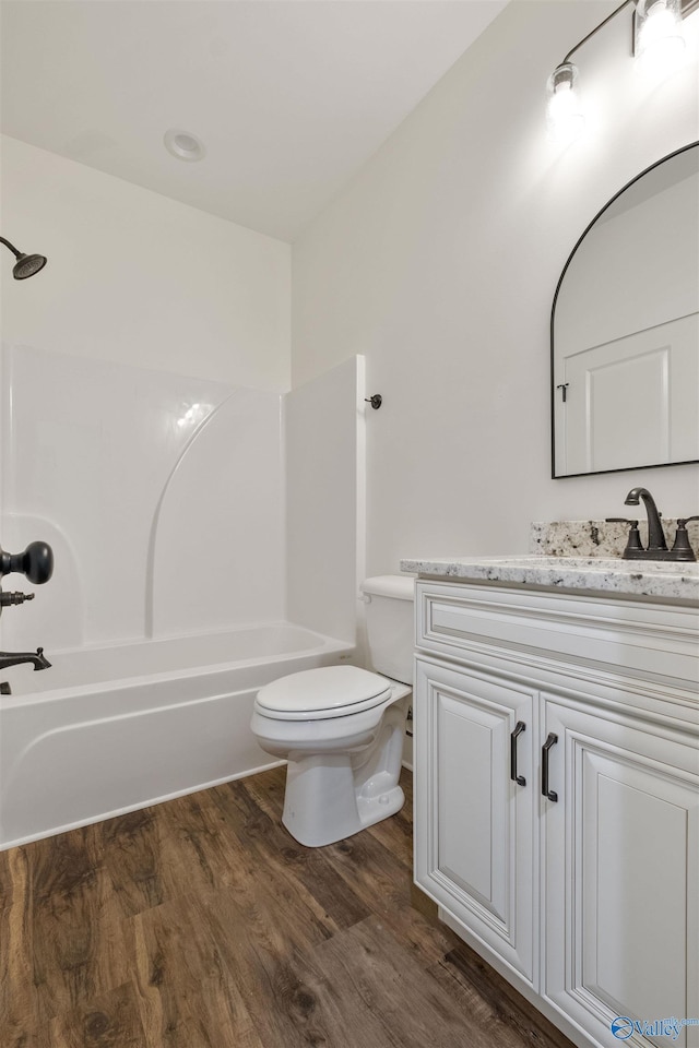 665 County Road 585, Cedar Bluff, AL 35959 - full bath with vanity, shower / bathtub combination, toilet, and wood finished floors