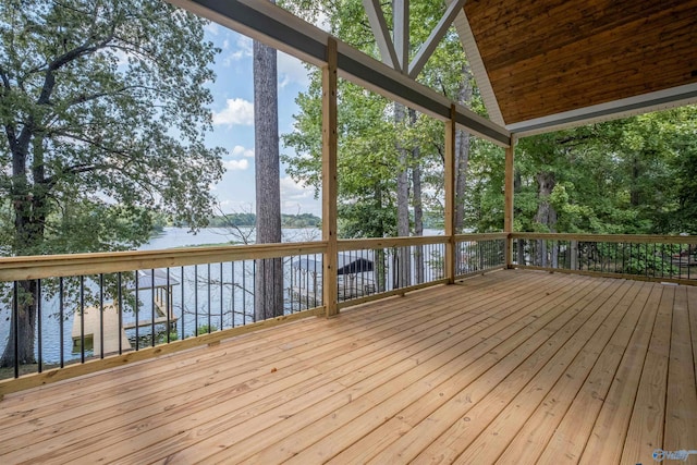 wooden deck with a water view