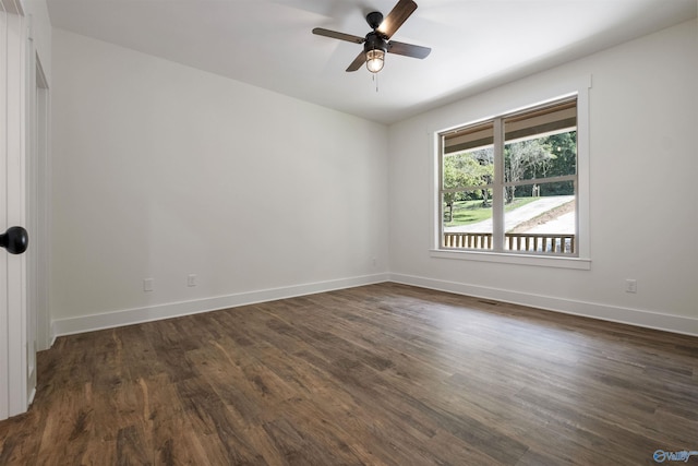 665 County Road 585, Cedar Bluff, AL 35959 - spare room featuring dark wood-type flooring, ceiling fan, and baseboards