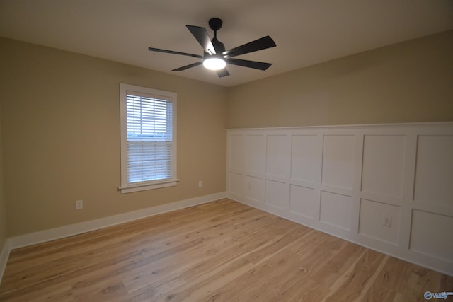 empty room featuring light hardwood / wood-style floors and ceiling fan