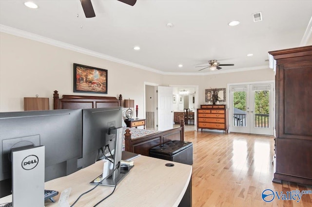 office area with light hardwood / wood-style floors, ornamental molding, and french doors