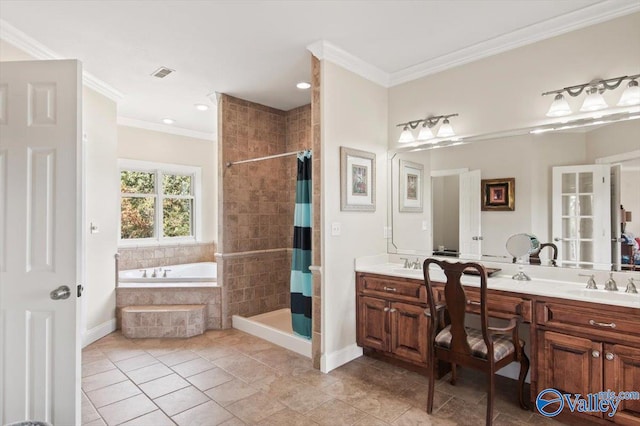 bathroom featuring ornamental molding, vanity, and separate shower and tub