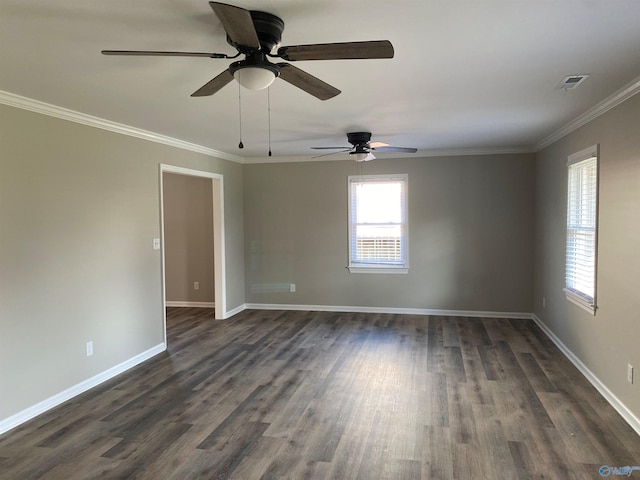 empty room with plenty of natural light, ceiling fan, ornamental molding, and dark wood finished floors