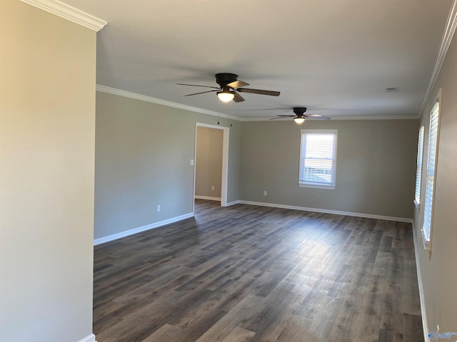 unfurnished room with ornamental molding, ceiling fan, baseboards, and dark wood finished floors