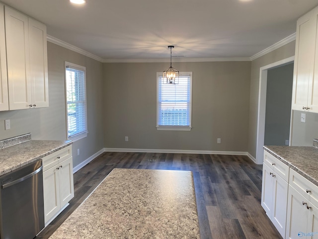 unfurnished dining area featuring baseboards, ornamental molding, and dark wood finished floors