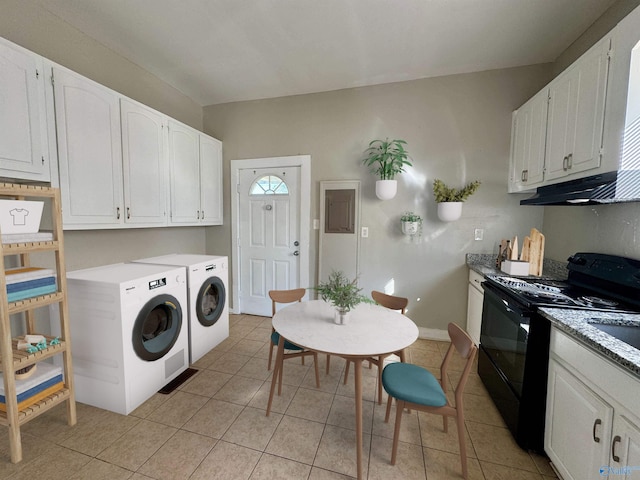 washroom featuring separate washer and dryer and light tile patterned flooring