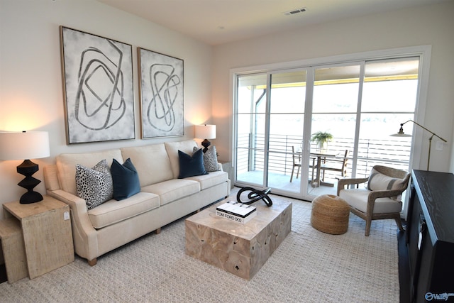 living room featuring light colored carpet