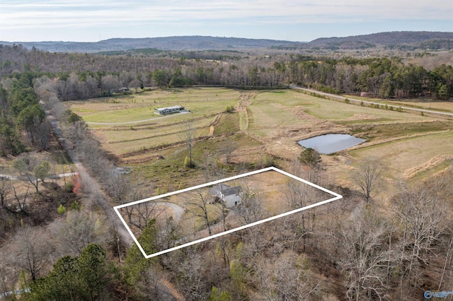 aerial view featuring a rural view and a forest view