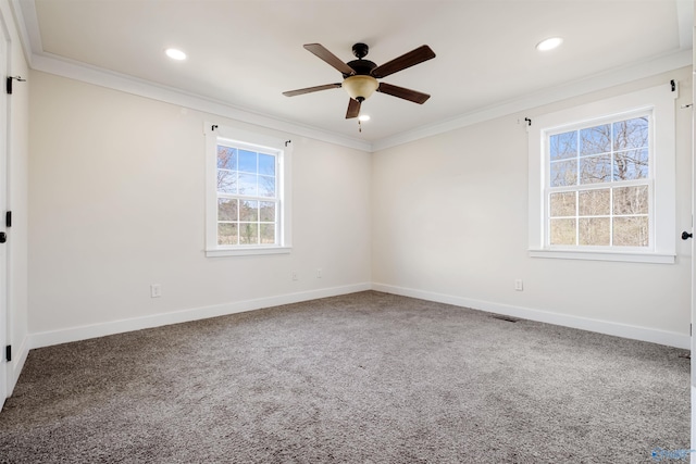 carpeted spare room featuring baseboards, recessed lighting, ceiling fan, and ornamental molding