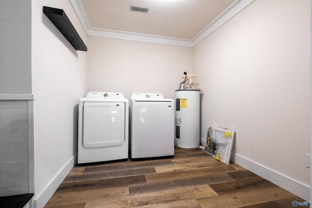 laundry area with water heater, crown molding, wood finished floors, washing machine and clothes dryer, and visible vents