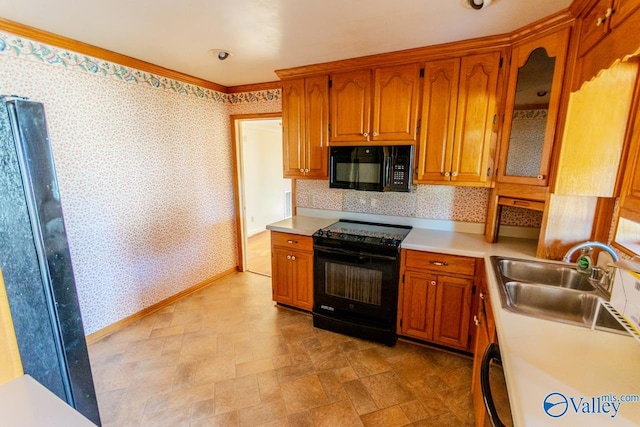 kitchen featuring sink and black appliances