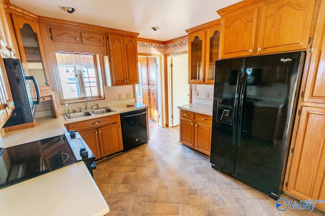 kitchen with sink and black appliances