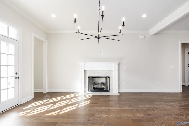 unfurnished living room featuring crown molding, a tile fireplace, and dark hardwood / wood-style floors