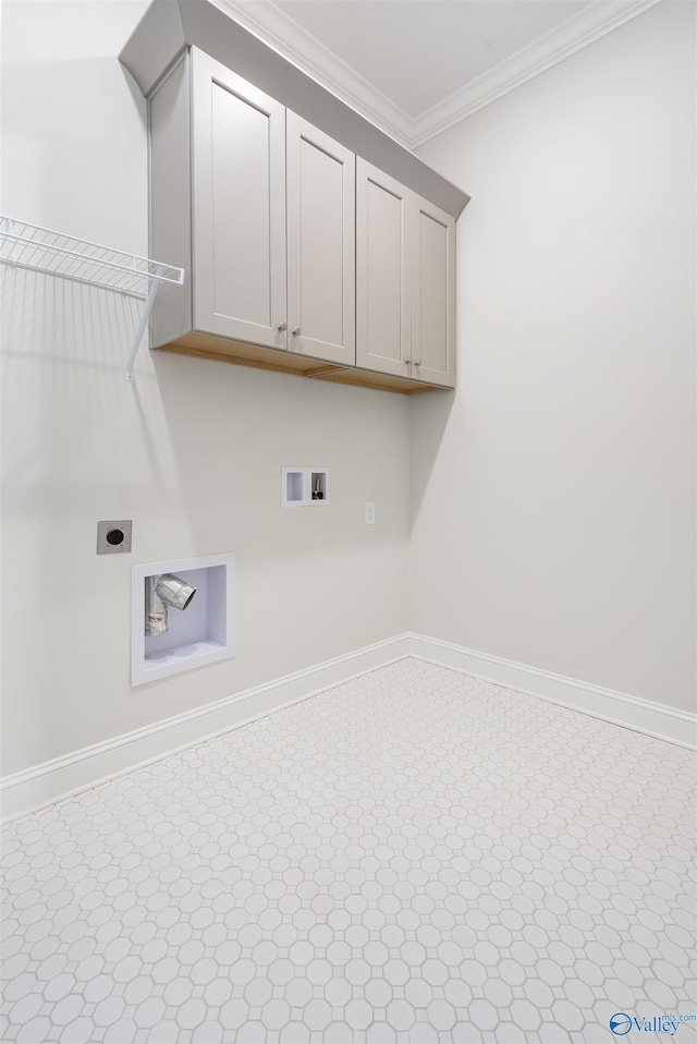 laundry area featuring cabinets, ornamental molding, electric dryer hookup, and hookup for a washing machine