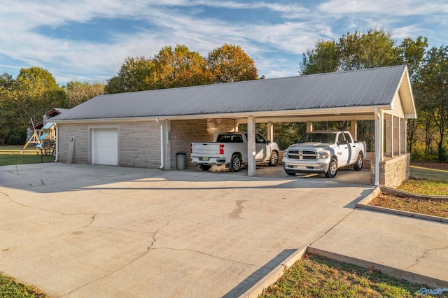 view of car parking with a garage and a carport