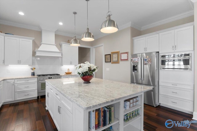 kitchen with custom exhaust hood, dark hardwood / wood-style floors, a kitchen island, white cabinetry, and stainless steel appliances