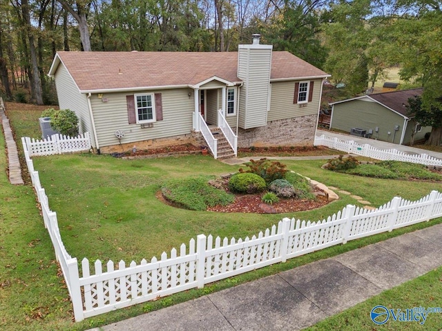 view of front of property with a front lawn