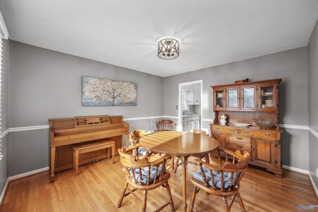 dining area featuring light hardwood / wood-style flooring