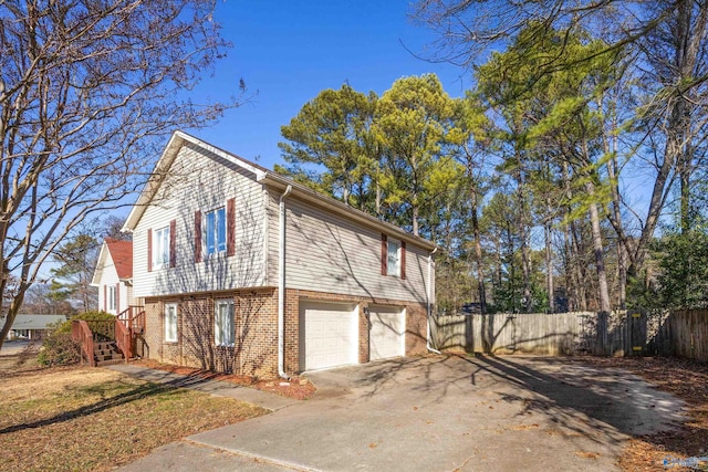 view of property exterior with a garage