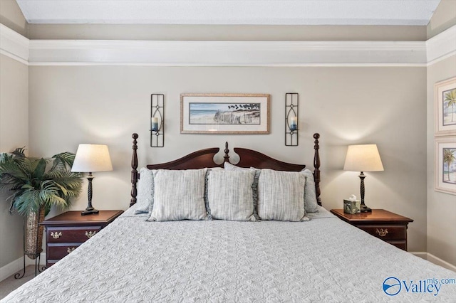 carpeted bedroom with baseboards